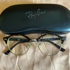 Bintahe Ray-Ban round eyeglasses frame with prescription attached